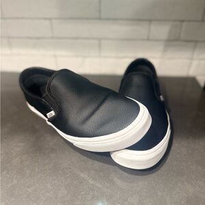 Vans Men's Black Perforated Slip-Ons with White Trim size: 8.5 men’s 10 Women’s